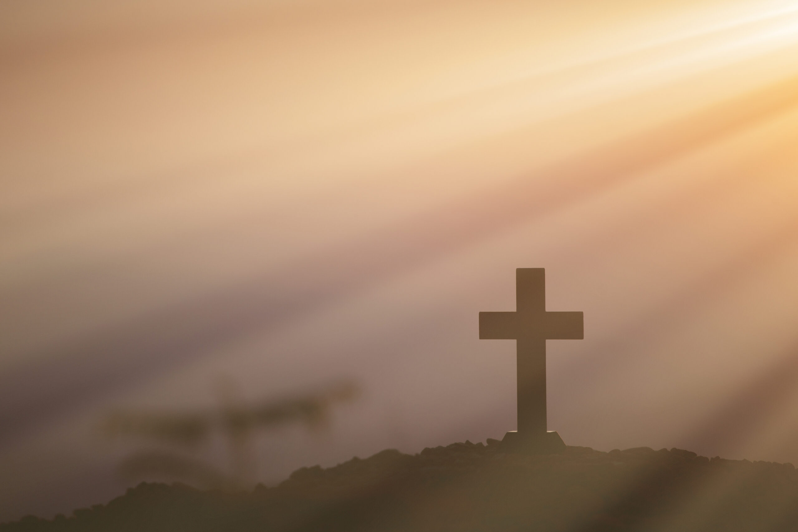 Resurrection concept:Crucifixion Of Jesus Christ Cross At Sunset Resurrection concept:Crucifixion Of Jesus Christ Cross At Sunset